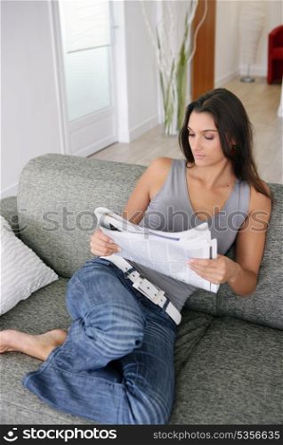 Woman reading the paper
