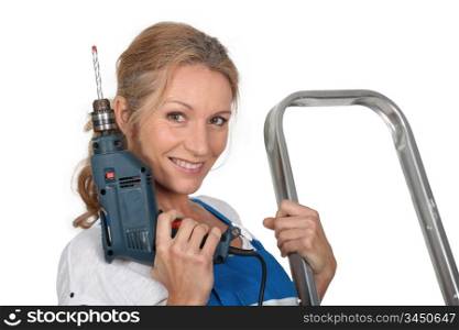 Woman ready with drill