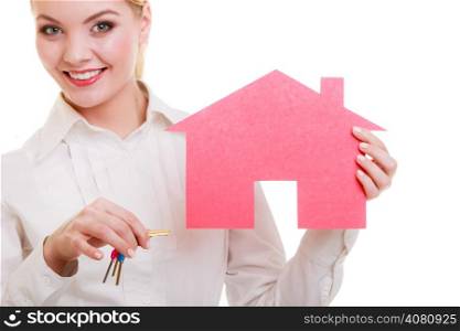Woman real estate agent holding red paper house and keys. Property business and accomodation or home buying ownership concept, isolated on white background