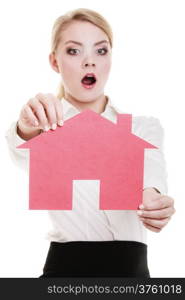 Woman real estate agent holding red paper house. Surprised shocked face expression. Property business and accomodation or loan concept isolated on white background