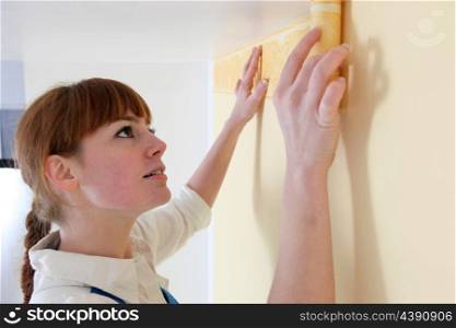 Woman redecorating her home