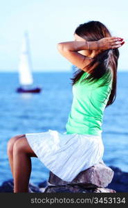 woman relax blue sea and ship on background