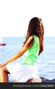 woman relax blue sea and ship on background