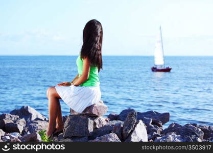 woman relax blue sea and ship on background