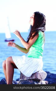 woman relax blue sea and ship on background
