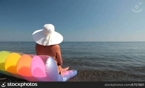 Woman relaxing at the beach