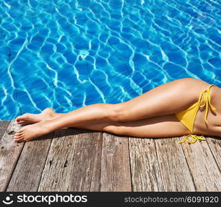 Woman relaxing at the pool