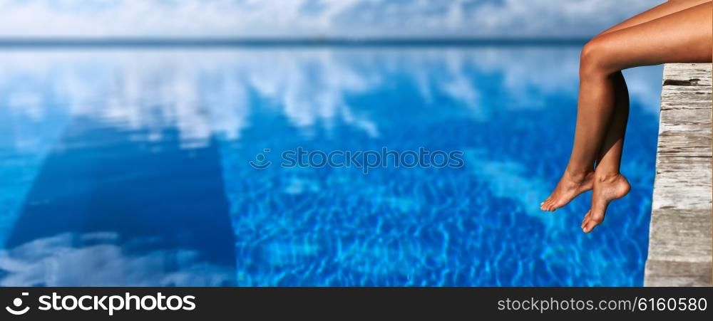 Woman relaxing at the pool