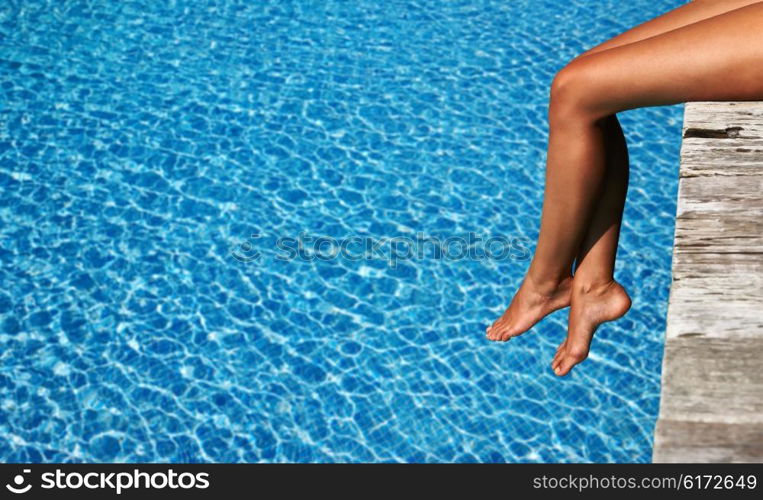 Woman relaxing at the pool