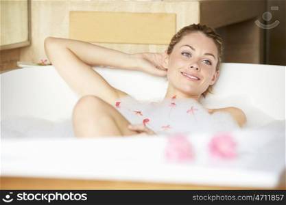 Woman Relaxing In Bubble Bath