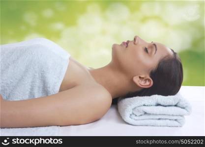 Woman relaxing in spa