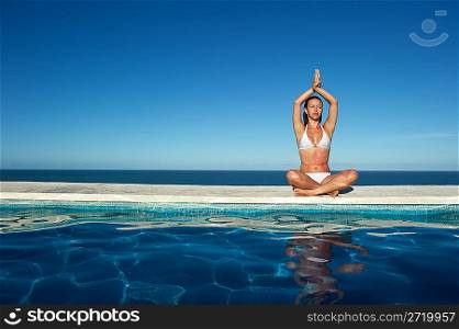 Woman relaxing in the spa swimming pool