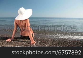 Woman relaxing on al beach