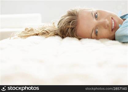 Woman Relaxing on Bed
