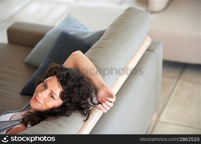 Woman Relaxing on Couch