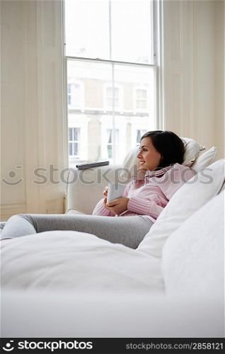 Woman Relaxing on Sofa