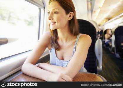 Woman Relaxing On Train Journey