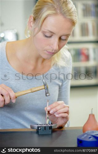 Woman replacing a watch strap