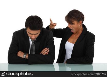 Woman reprimanding her employee