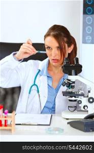 Woman researcher using analyzing sample&#xA;