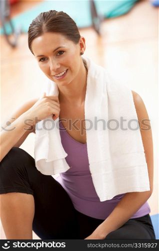 Woman Resting After Exercises In Gym