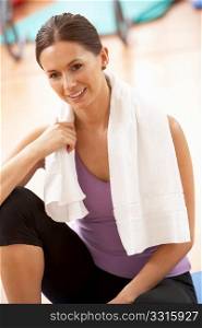 Woman Resting After Exercises In Gym