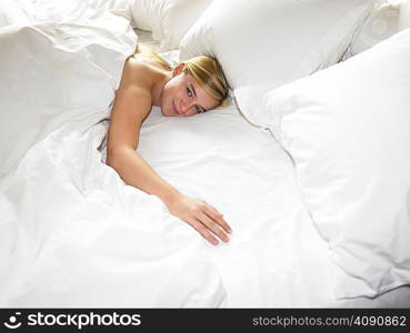 Woman resting in bed