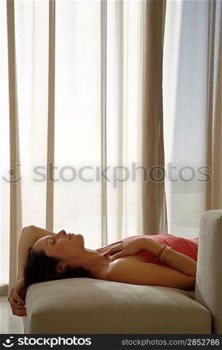 Woman Resting on Couch