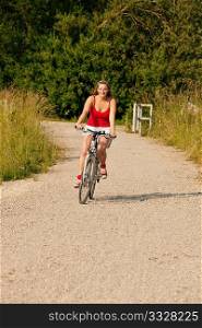 Woman riding her bicycle on a nice summer day
