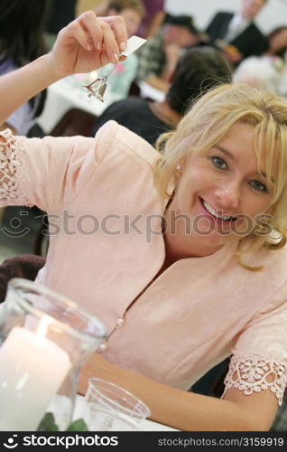 Woman ringing a bell