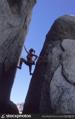 Woman Rock Climbing