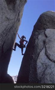 Woman Rock Climbing