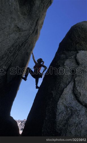 Woman Rock Climbing at Buttermilks, CA