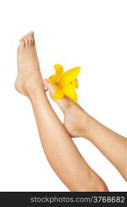 Woman&rsquo;s Feet and legs with flower isolated on white. Manicure and Pedicure concept. Nails. Spa.