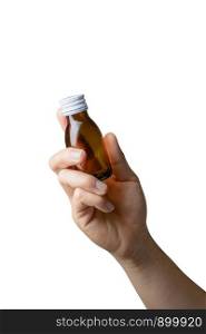 Woman's hand holding empty small brown medicine bottle liquids transparent on white background. File contains a clipping path.