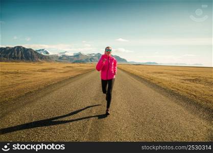 Woman running on a winter day