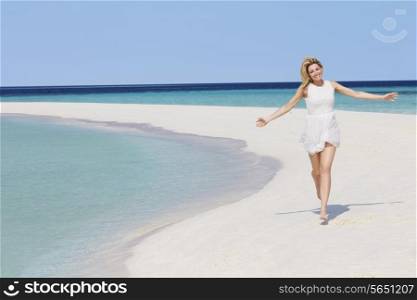 Woman Running On Beautiful Tropical Beach