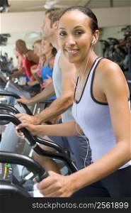 Woman Running On Treadmill At Gym