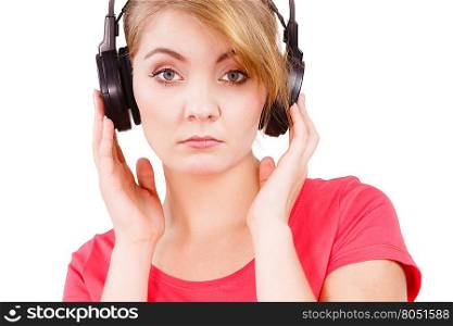 Woman sad girl in big headphones listening music. Woman sad unhappy girl in big headphones listening music mp3 closeup on white. Broken heart love concept