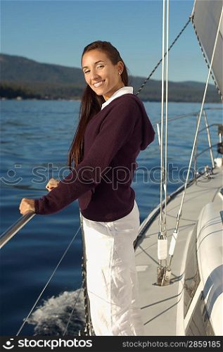 Woman Sailing on Mountain Lake