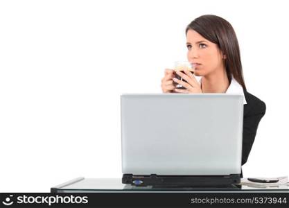 Woman sat at laptop
