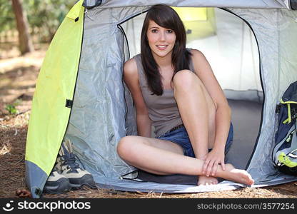 woman sat in tent