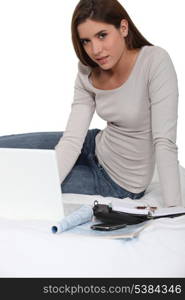 Woman sat with paperwork