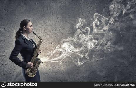 Woman saxophonist. Young pretty woman in suit playing saxophone