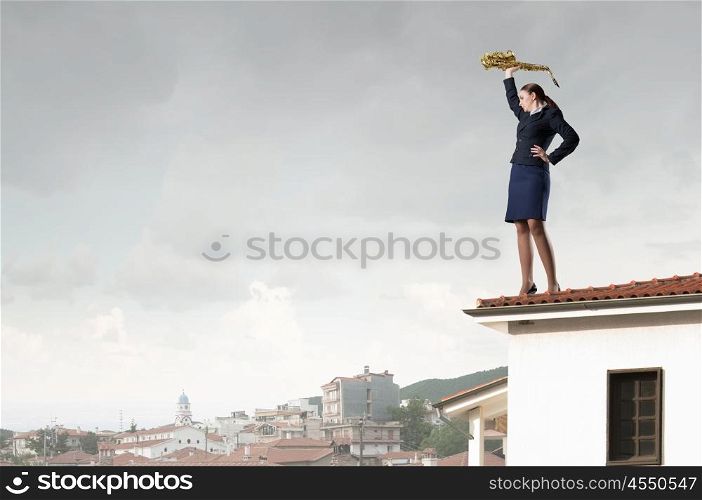 Woman saxophonist. Young woman in suit with saxophone in hands