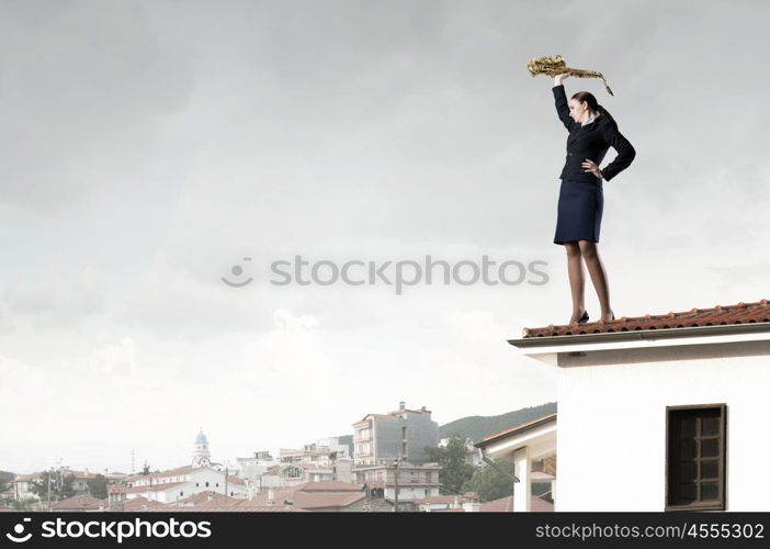 Woman saxophonist. Young woman in suit with saxophone in hands