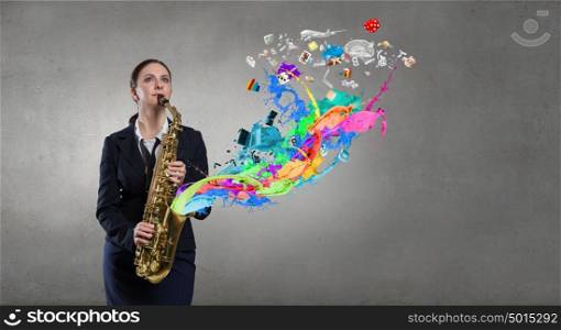 Woman saxophonist. Young woman playing saxophone and colorful splashes coming out