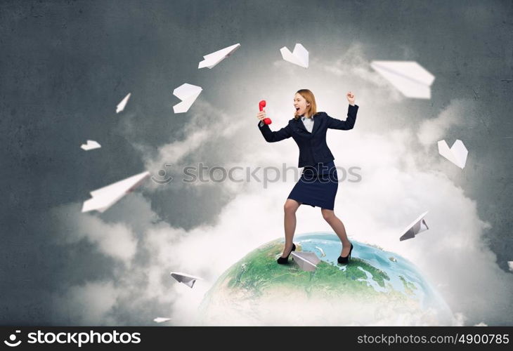 Woman scream in red receiver. Young businesswoman with red phone receiver in hands. Elements of this image are furnished by NASA