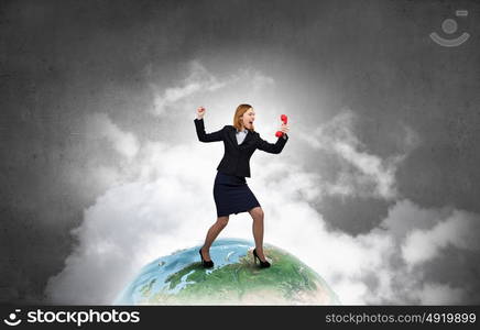 Woman scream in red receiver. Young businesswoman with red phone receiver in hands. Elements of this image are furnished by NASA