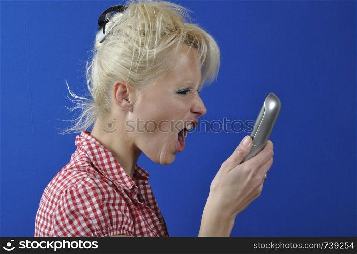 woman screaming in the phone